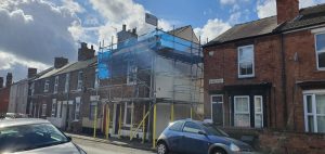 terraced house with scaffolding on the front - image 2