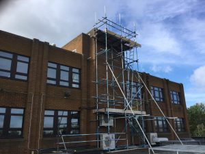 scaffolding equipment on the back of the government office in Lincoln - image 3
