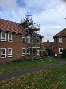 scaffolding on a house for roof access - image 2