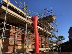 scaffolding surrounding an entire building in Lincoln