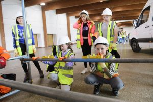 Construction Week 2023 - Children With Spirit Level | Premier Access Scaffolding